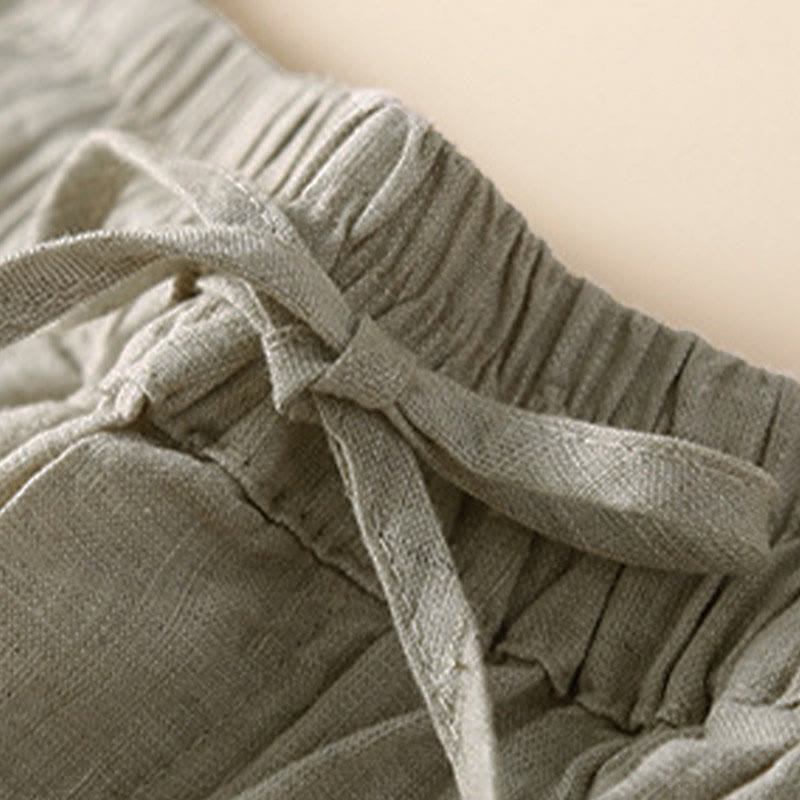 Relaxed Drawstring Shorts with Elegant Lace-Trimmed Hem
